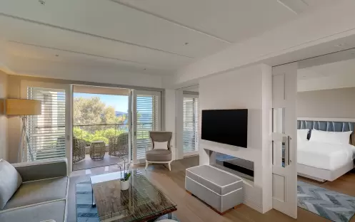 CARESSE HOTEL - ONE BEDROOM SUITE LIVING ROOM CARESSE HOTEL - ONE BEDROOM SUITE LIVING ROOM