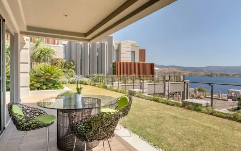 CARESSE HOTEL - TWO BEDROOM SUITE BALCONY CARESSE HOTEL - TWO BEDROOM SUITE BALCONY
