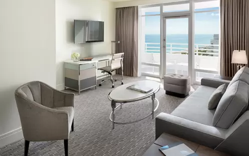 Fontainbleau - Bay View Junior Suite with Balcony Living Room Fontainbleau - Bay View Junior Suite with Balcony Living Room