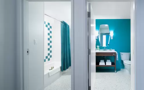 Universal’s Cabana Bay Beach Resort - Two Bedroom Suite Washroom split view Universal’s Cabana Bay Beach Resort - Two Bedroom Suite Washroom split view