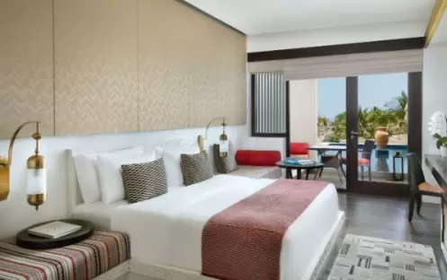 Anantara Al Baleed - Deluxe Room Bedroom Anantara Al Baleed - Deluxe Room Bedroom