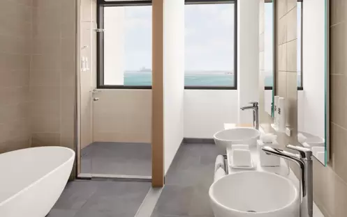 Mövenpick Resort Al Marjan Island - Panoramic Bridge Pool & Beach View Suite Bathroom Mövenpick Resort Al Marjan Island - Panoramic Bridge Pool & Beach View Suite Bathroom
