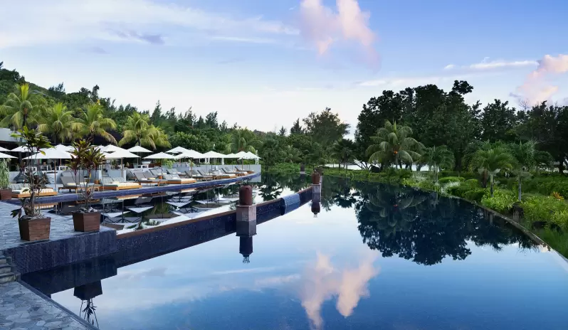 Raffles Seychelles, Pool Sunset Raffles Seychelles, Pool Sunset