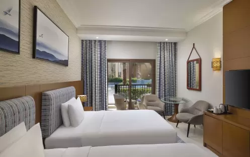 middle-east-holidays-ras-al-khaimah-doubletree-by-hilton-resort-spa-marjan-island-hotel-guest-room-with-pool-view middle-east-holidays-ras-al-khaimah-doubletree-by-hilton-resort-spa-marjan-island-hotel-guest-room-with-pool-view
