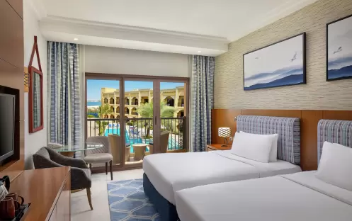 middle-east-holidays-ras-al-khaimah-doubletree-by-hilton-resort-spa-marjan-island-hotel-guest-room-with-pool-view middle-east-holidays-ras-al-khaimah-doubletree-by-hilton-resort-spa-marjan-island-hotel-guest-room-with-pool-view